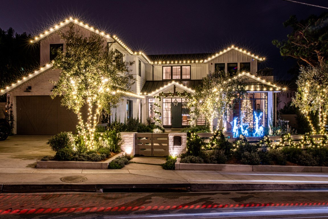 New first image: Holiday lighting covers a Bel Air home, shrubs and trees decorated by Christmas Brothers professional Christmas light installers