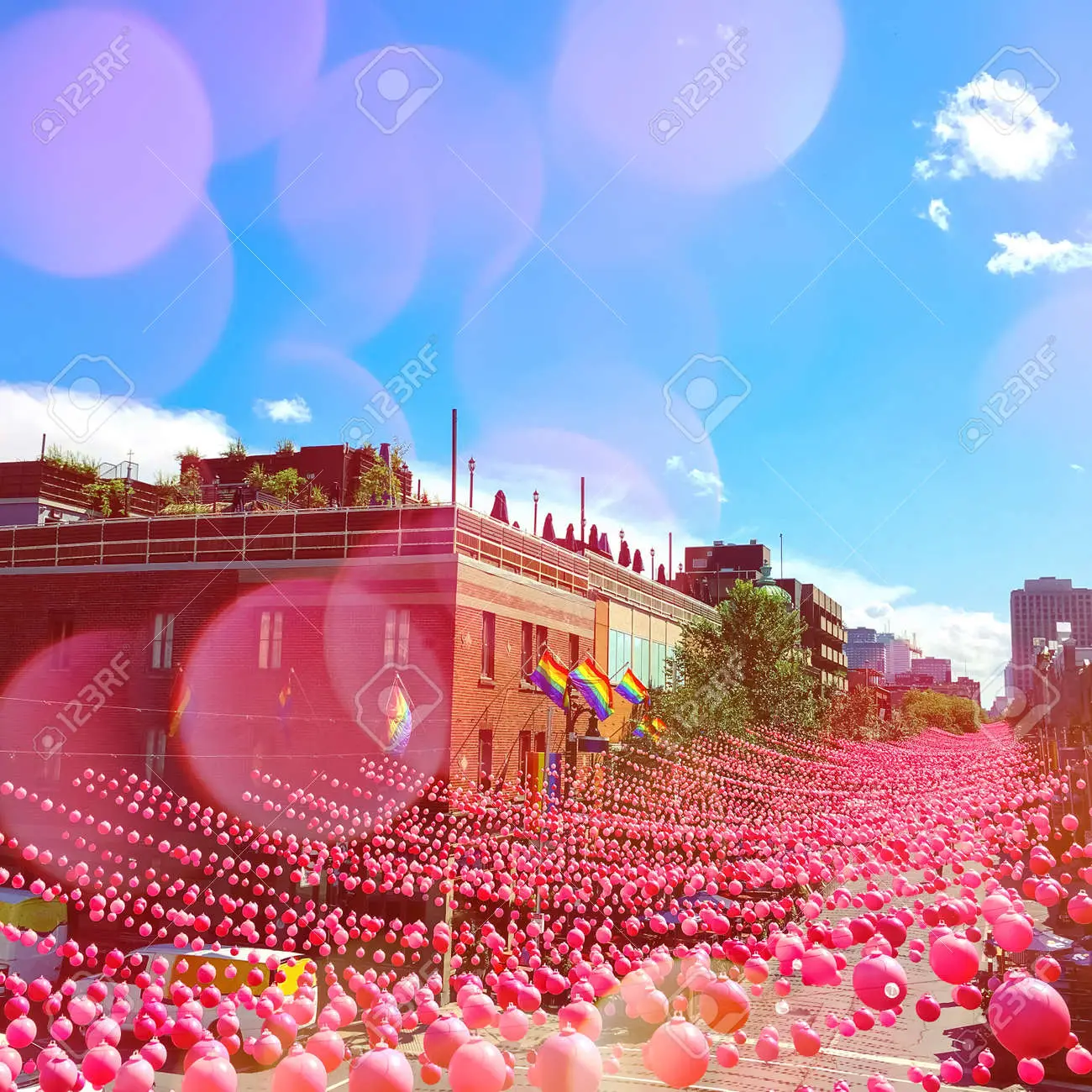 97150948 Summer Party Street In Neighborhood Decorated With Pink Balls With Bokeh Light Effect Annual